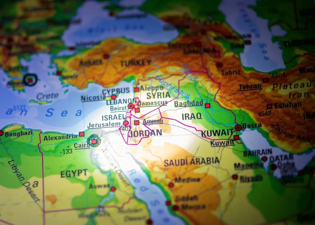 Close-up fragment of a world map with selective focus on Jordan, Jerusalem, Israel, Iraq, Kuwait